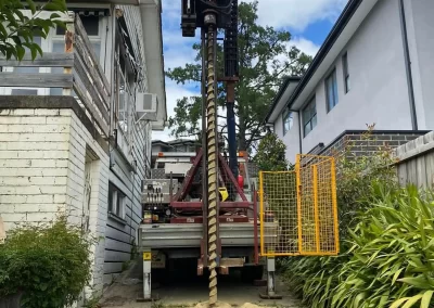 A powerful drill rig attached to a Probe Geotech Toyota Landcruiser meticulously conducts a residential soil test in Melbourne, revealing crucial data for confident foundation design.