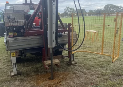 A truck-mounted drilling rig prepares for a Standard Penetration Test on a construction site in Melbourne, Victoria.