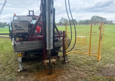 A truck-mounted drilling rig prepares for a Standard Penetration Test on a construction site in Melbourne, Victoria.