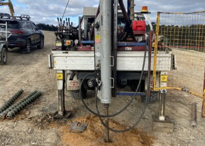 A truck-mounted drilling rig prepares for a Standard Penetration Test on a construction site in Melbourne, Victoria.