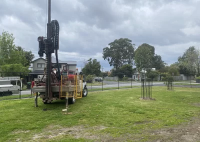 A geotechnical engineer from Probe Geotechnical Services is performing a land capability assessment in Melbourne using modern instruments.