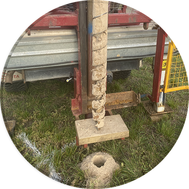 The drill rig mounted to the strong Toyota Landcruiser truck drilling, representing Probe Geotechnical Services' capabilities in Melbourne, Victoria.